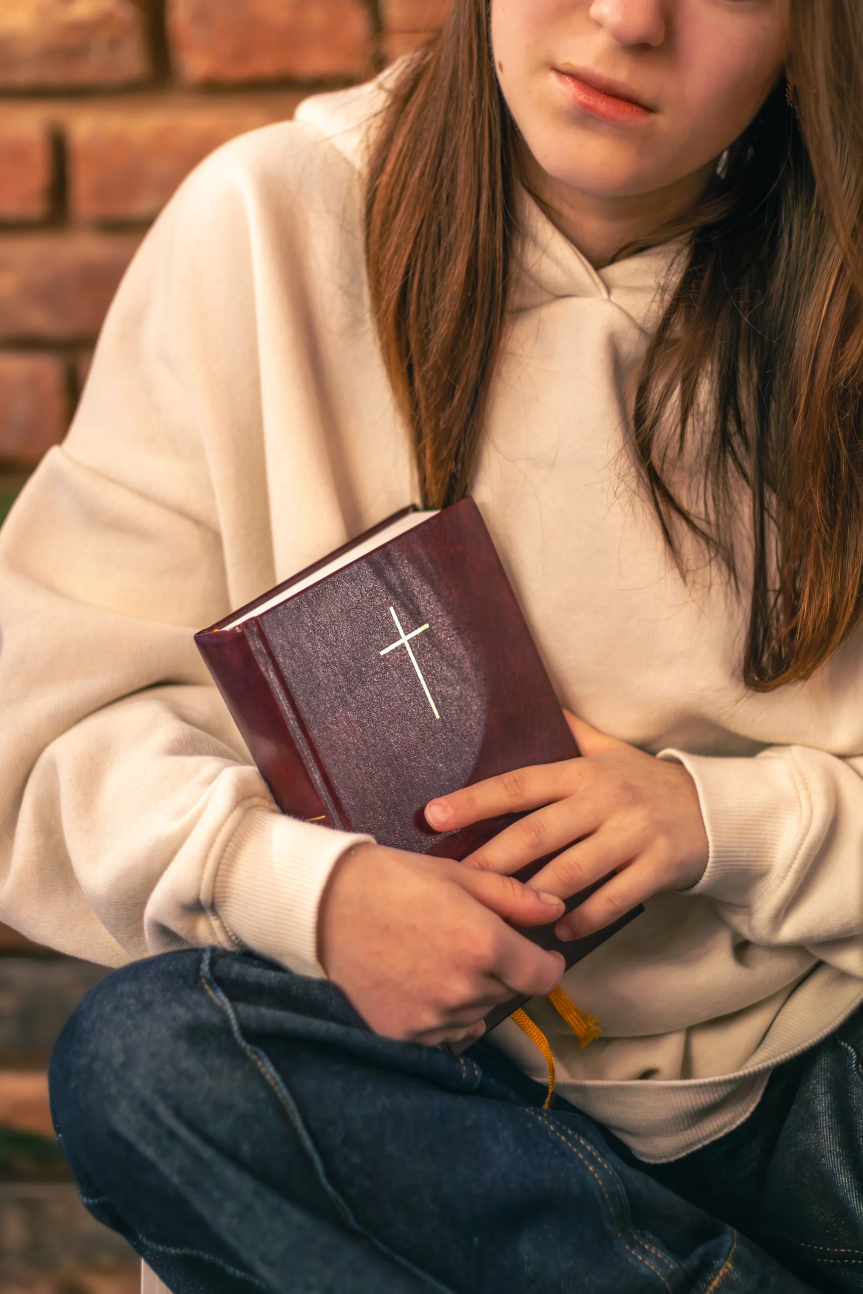 woman holding a Bible in her hands